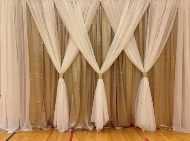Gold and white draped backdrop