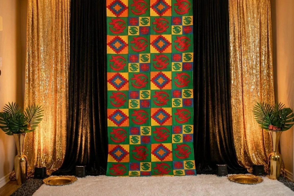 Kente patterned backdrop with gold draping