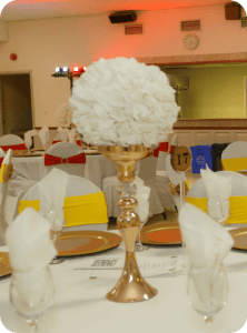 Gold pedestal white floral centerpiece